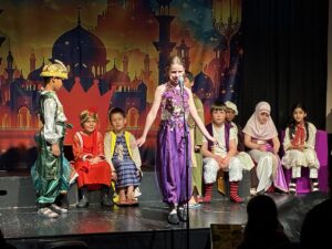 Aladdin on stage at Wilmslow Prep