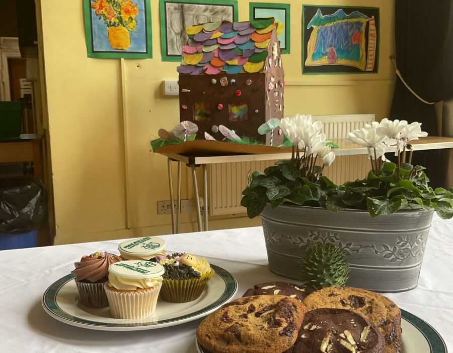 Cakes set up for Macmillan Coffee Morning event
